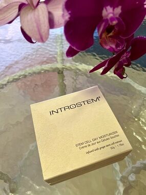 Introstem Stem Cell empty box and cream jar